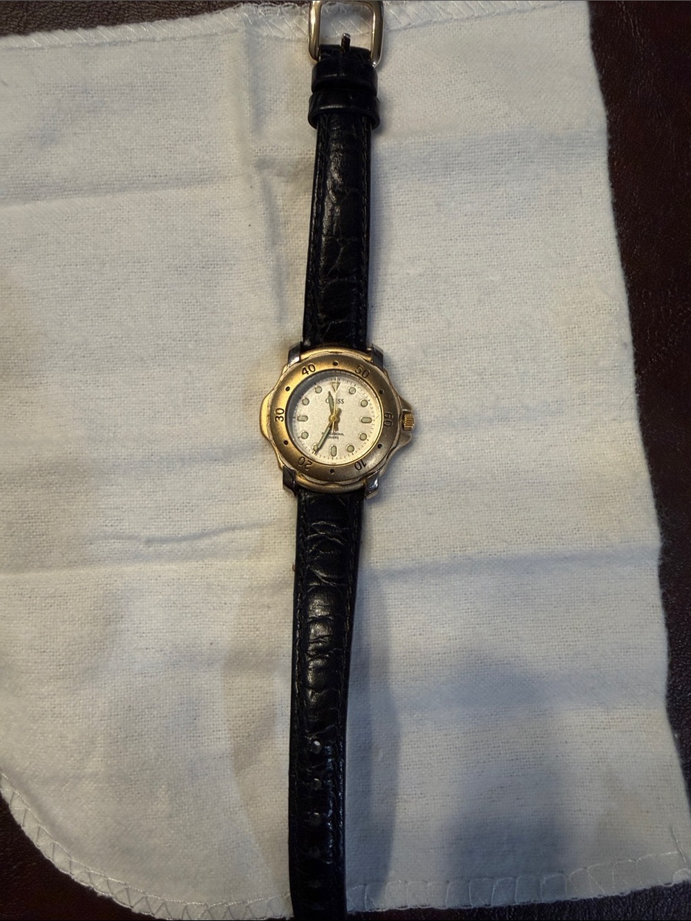 Women’s two tone Guess Black Leather Watch with Gold-Tone Case